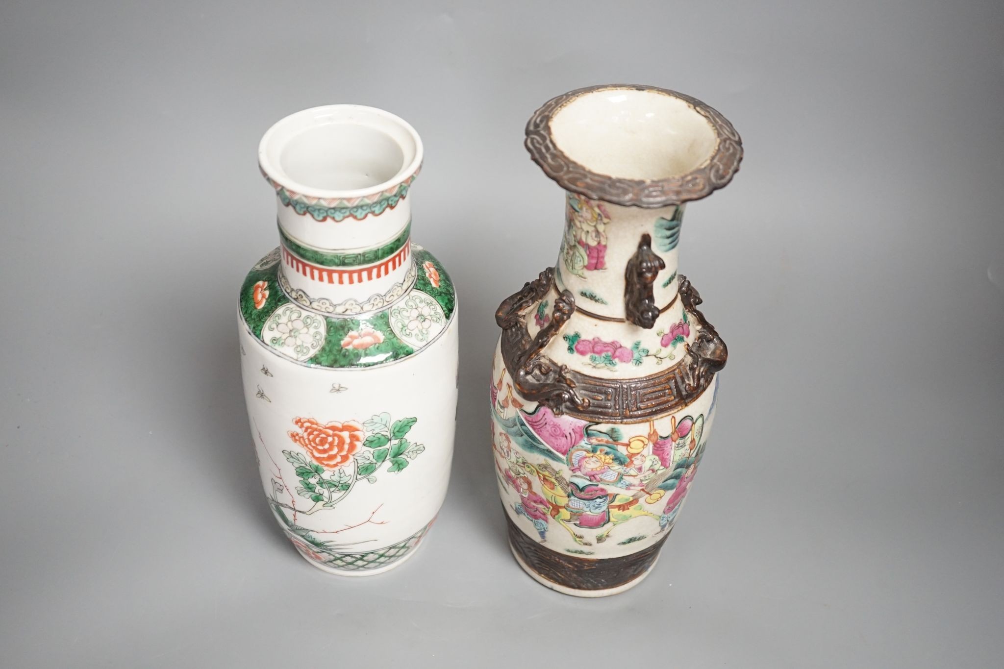 A Chinese crackle glaze ‘warriors’ vase and a Chinese famille verte ‘phoenix’ vase, both early 20th century Crackle ware vase 25 cms high.